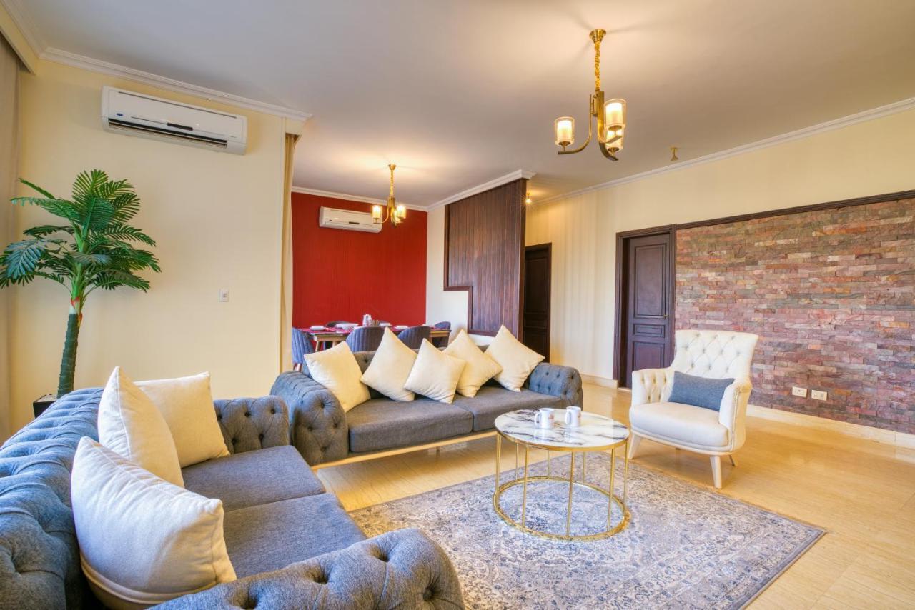 The Suites Near Auc By Elegant Cairo Exterior photo